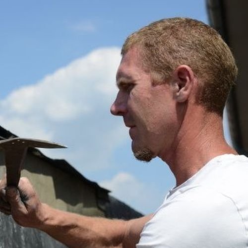 Zijkant-bekleden-met-shingles Dakdekker Elburg met nokvorsten